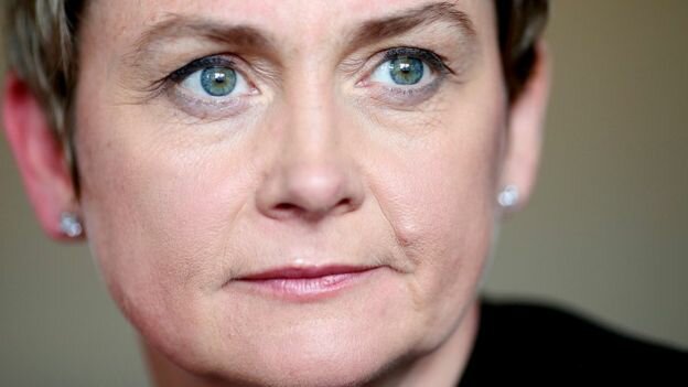 Yvette Cooper read out abusive tweets from a user's account to the committee.