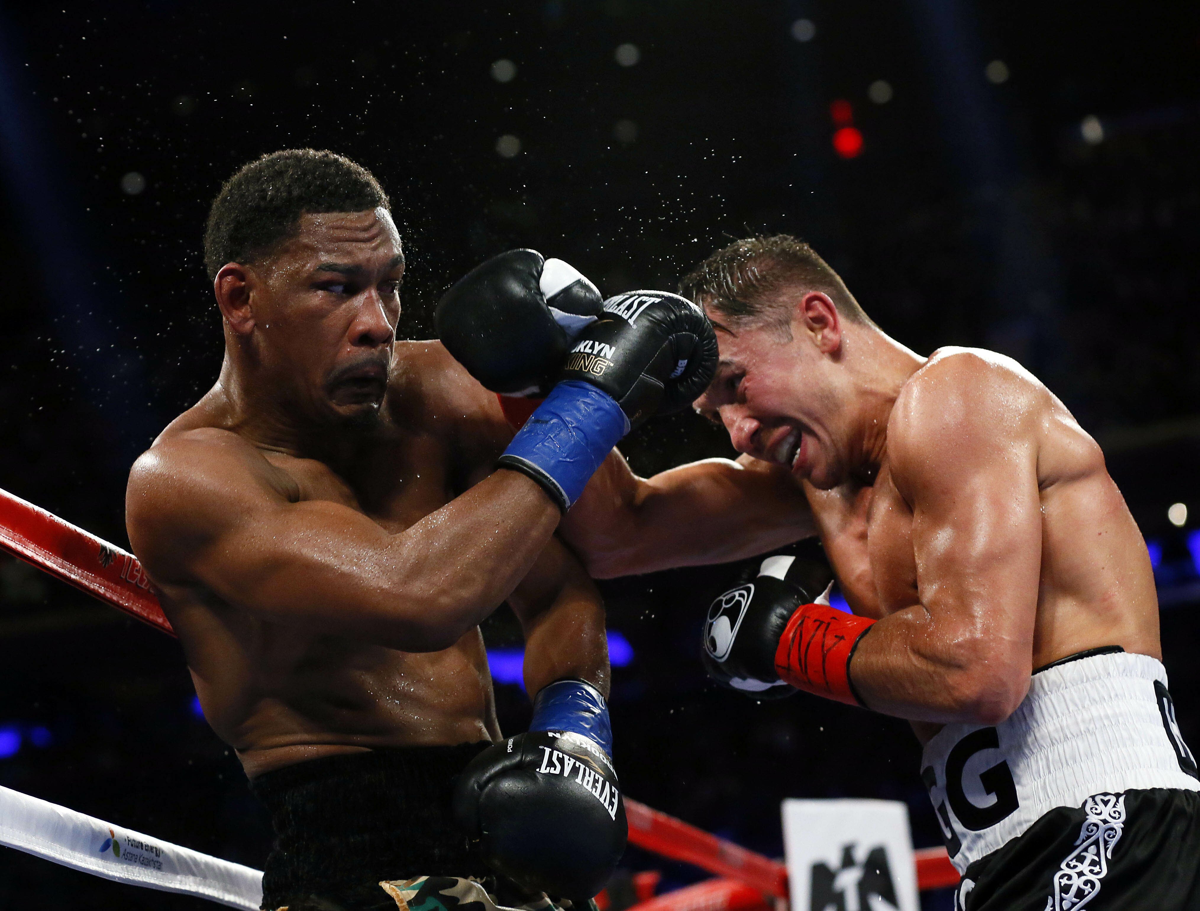 Mar 18, 2017; New York City, NY, USA; Daniel Jacobs and Gennady Golovkin exchange punches during middleweight world championship fight at Madison Square Garden. Mandatory Credit: Noah K. Murray-USA TODAY Sports