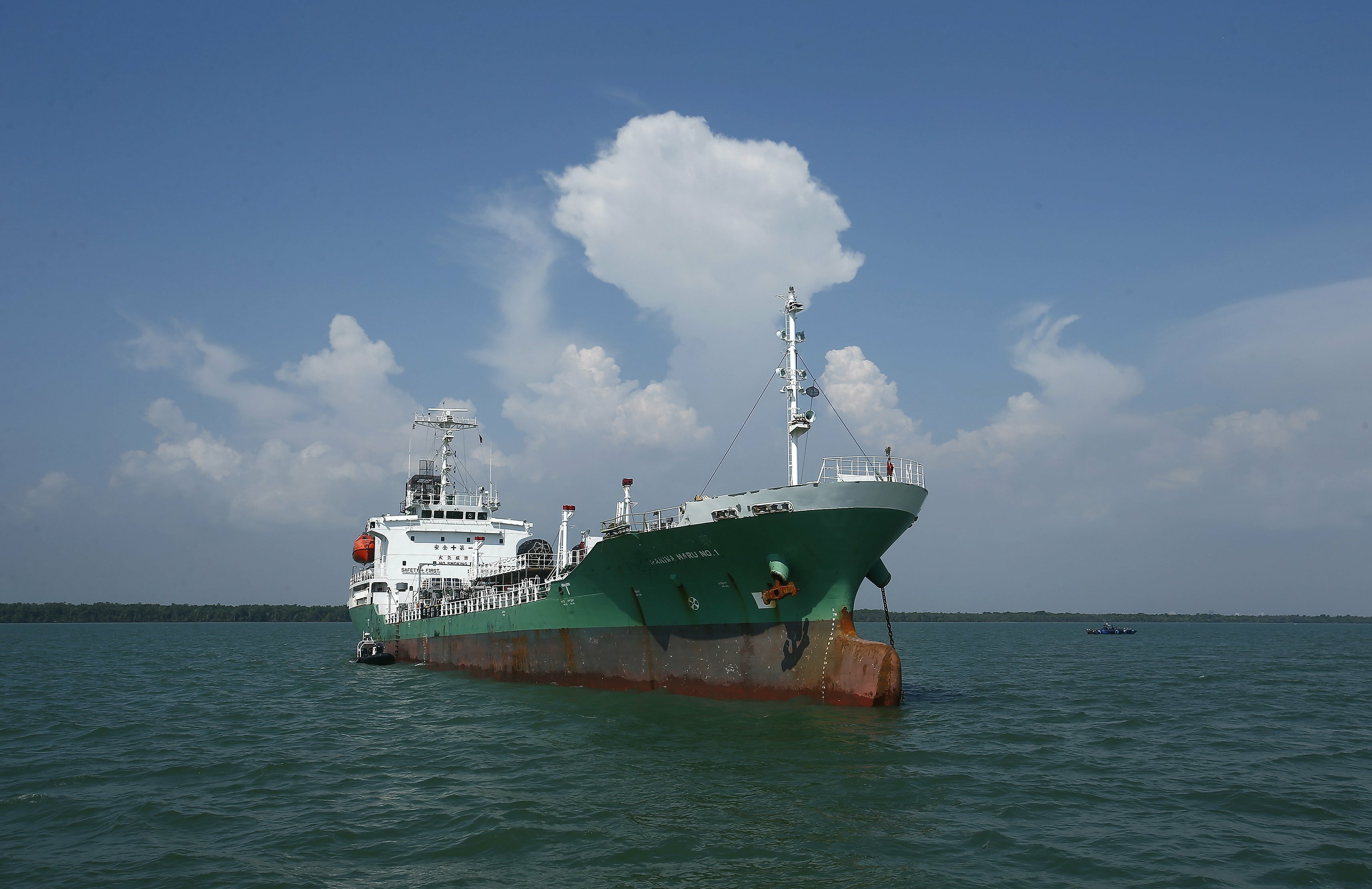The Japanese oil tanker which was raided by armed pirates sails at Port Klang